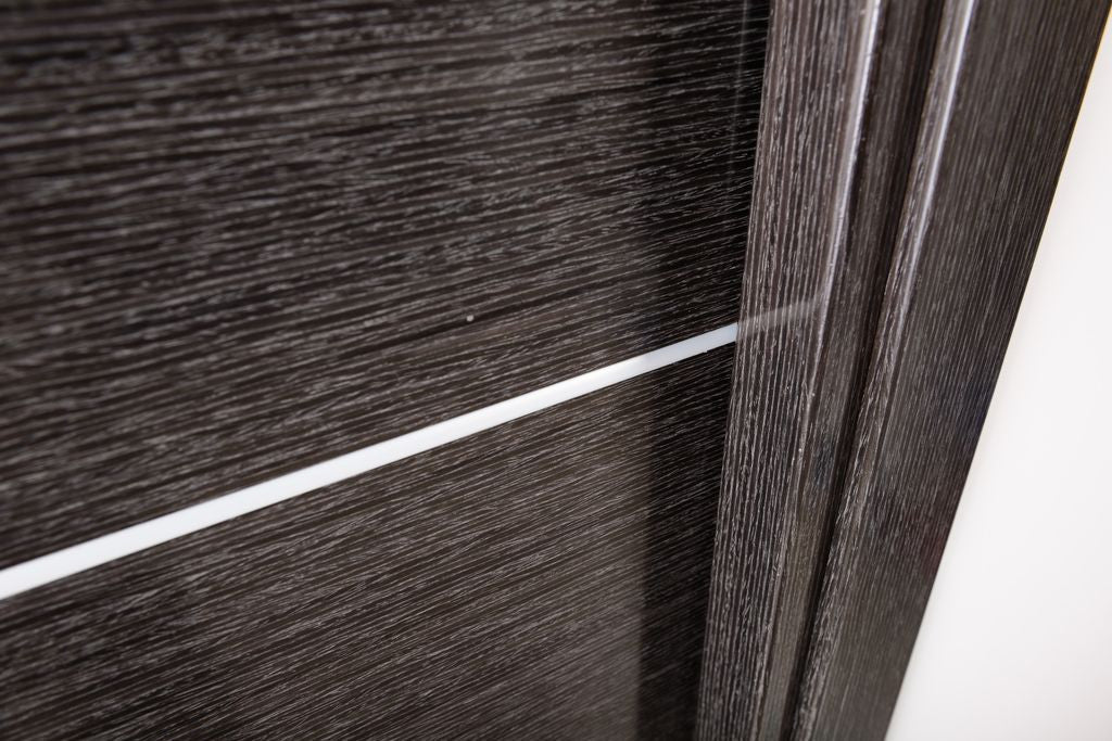 Avanti Interior Door In A Black Apricot Finish W/ Silver Strips